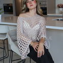 PONCHO CORTO CALADO BEIGE
