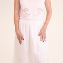CONJUNTO FALDA TOP TIRANTE MOÑO