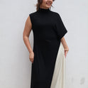 BLUSÓN DESIGUAL CUELLO ALTO