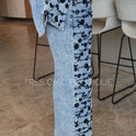 PANTALÓN DENIM FLORES NEGRAS