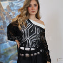 PONCHO CALADO FLECOS NEGRO