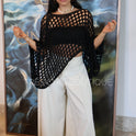 PONCHO CORTO CALADO NEGRO