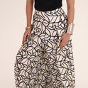 PANTALON ESTAMPADO HOJAS blanco-con-negro
