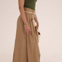 PANTALON TRENZA POMPON beige